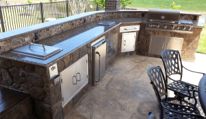 Outdoor Kitchen island with cabinets | Above & Beyond Lawn & Landscaping