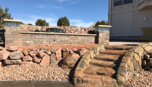 Custom Stone Retaining Wall Stairs by Above & Beyond Lawn & Landscaping