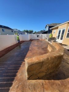 Curved retaining wall by Above & Beyond Lawn & Landscaping